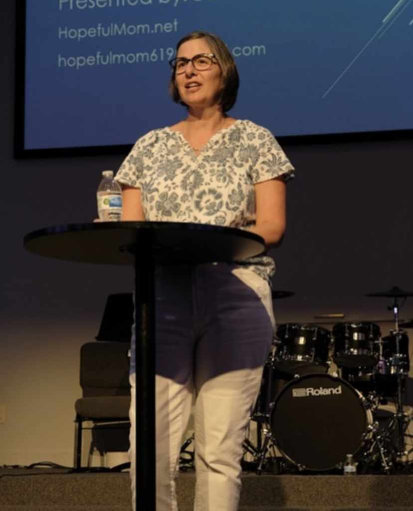 Barb Winters speaking at a youth group